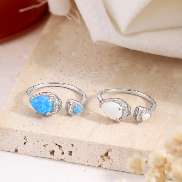 S925纯银蓝色梨形水滴形肥三角合成澳宝石圆锆微镶开口戒指